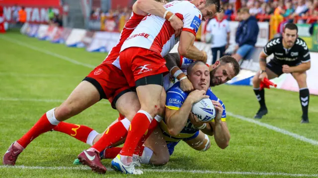 Tom Lineham scores a try for Warrington