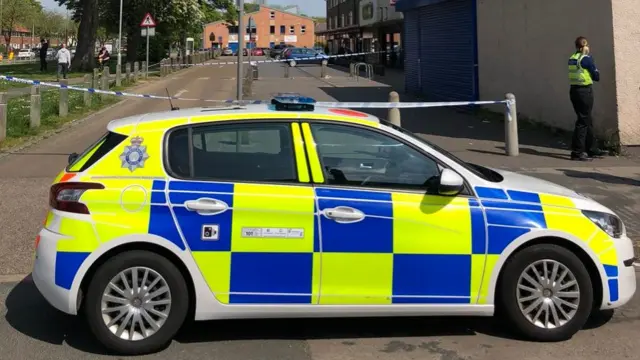 A police car at the scene