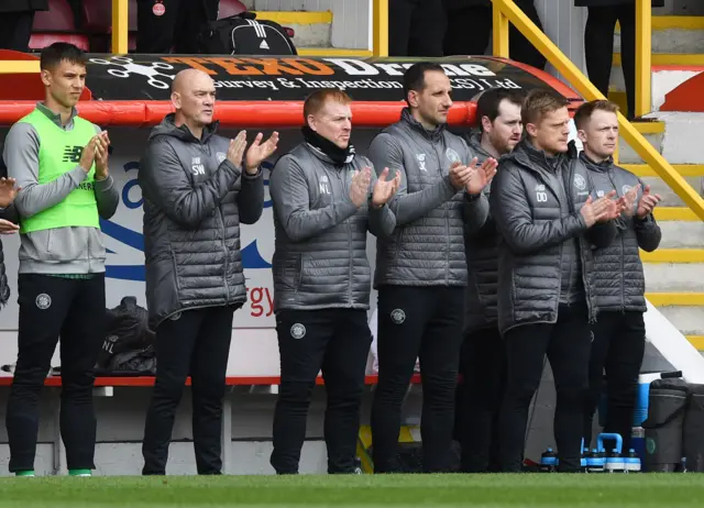 Neil Lennon and his staff pay tribute.