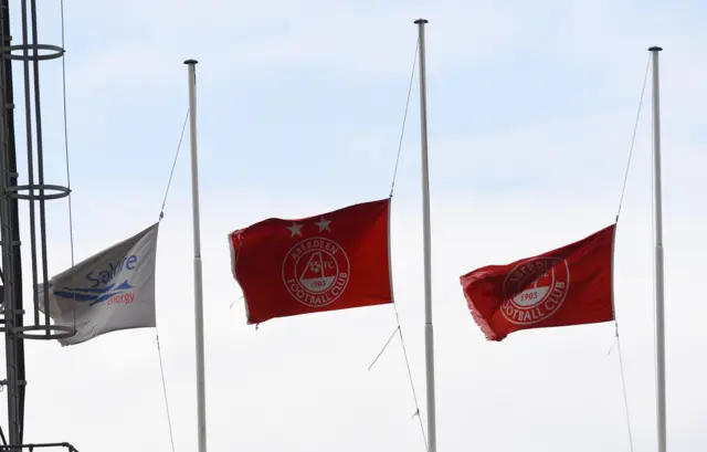 The PIttodrie flags are at half-mast today