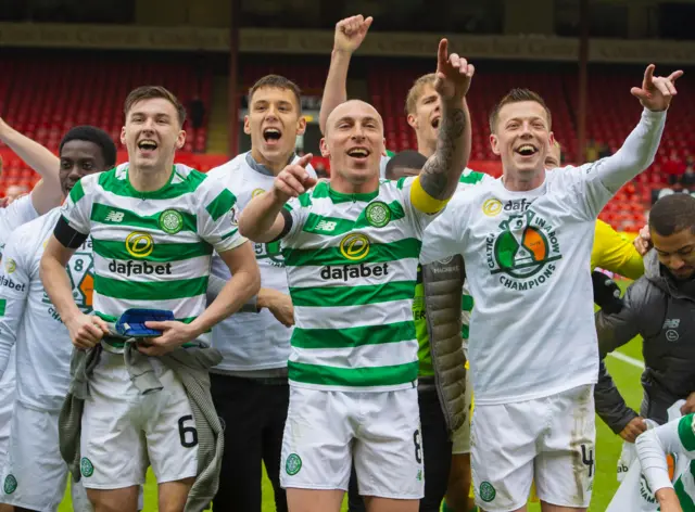 Celtic players celebrate title win