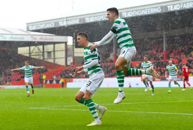 Mikael Lustig celebrates the opening goal at Pittodrie