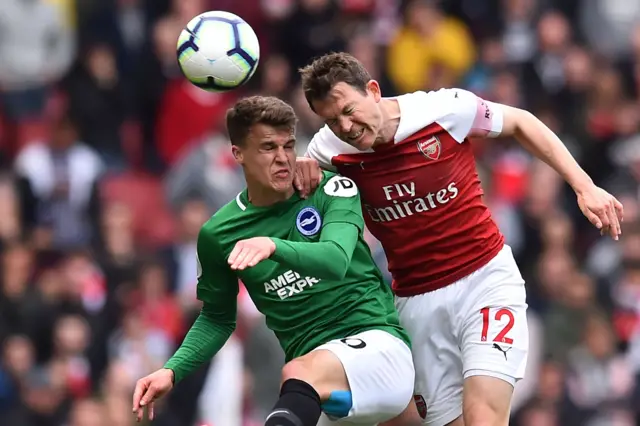 Solly March battles for the ball