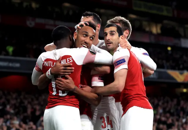 Arsenal celebrate against Valencia