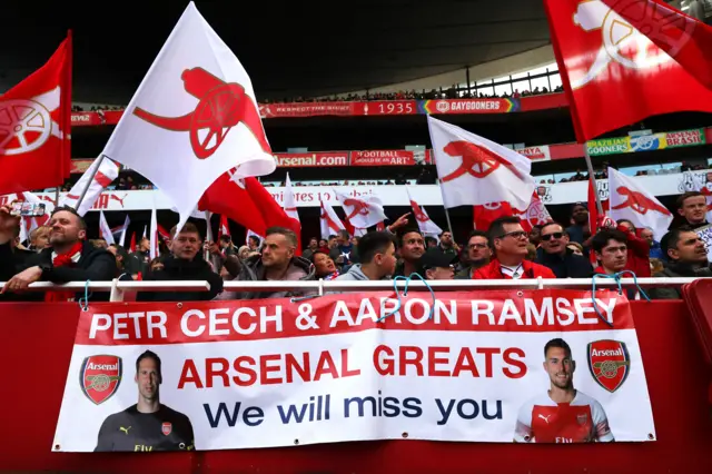 Arsenal fans' banner saying: "Petr Cech & Aaron Ramsey - Arsenal greats we will miss you."