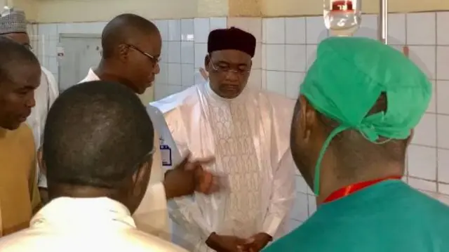 President Issoufou Mahamadou (centre) visiting the injured