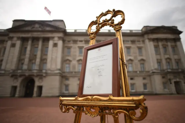 Easel outside Buckingham Palace