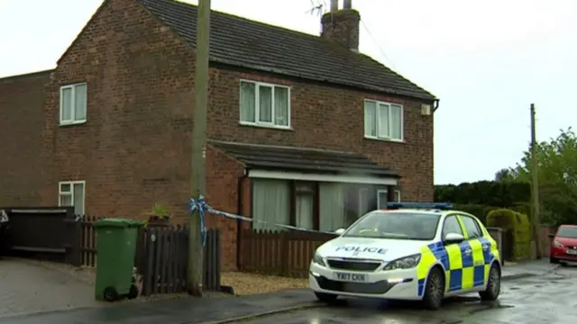 Police outside a house in Worlaby