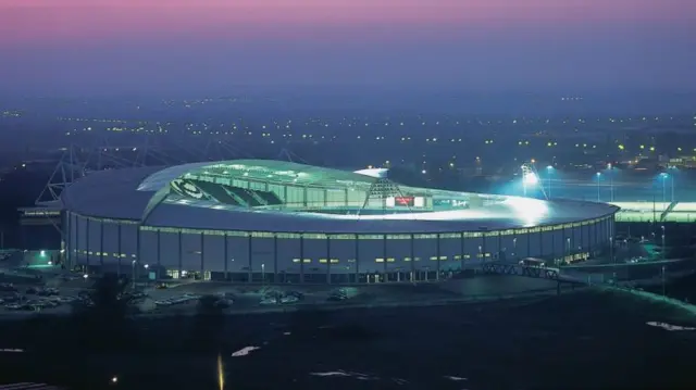 The KCOM Stadium at night