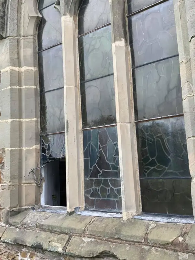 Broken window at All Saints Church, Scraptoft