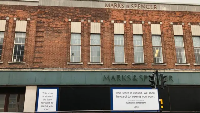 A sign outside Marks and Spencer