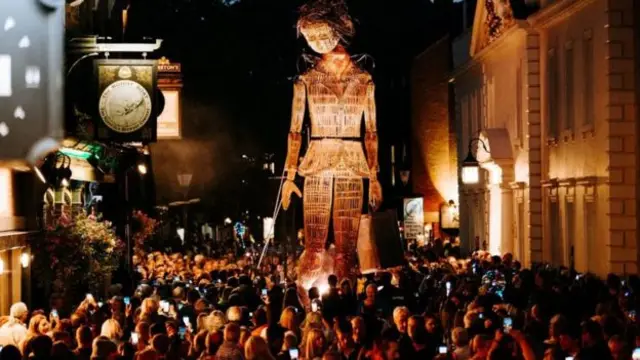 Giant puppets parade through the streets during last year's event