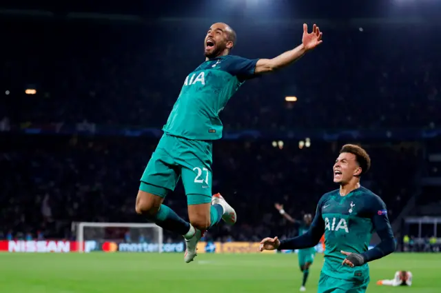 Moura and Alli celebrate