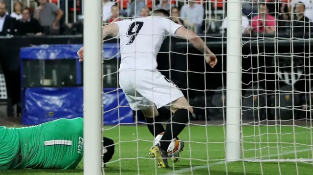 Kevin Gameiro bundles in the ball for Valencia