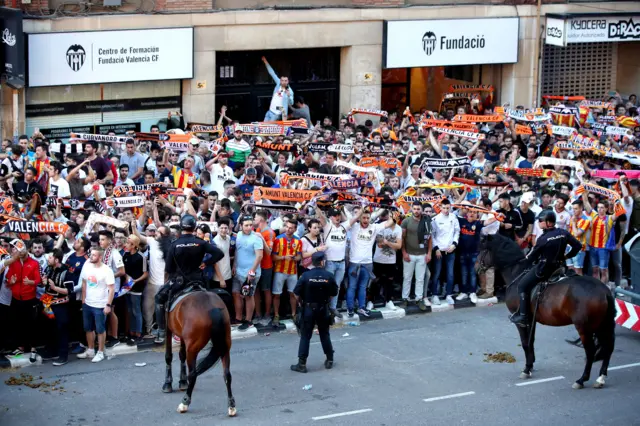 Valencia fans make their way to the Mestalla