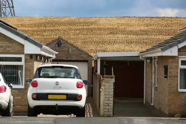 Cars and mound