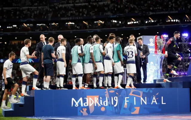 Tottenham Hotspur collect their medals