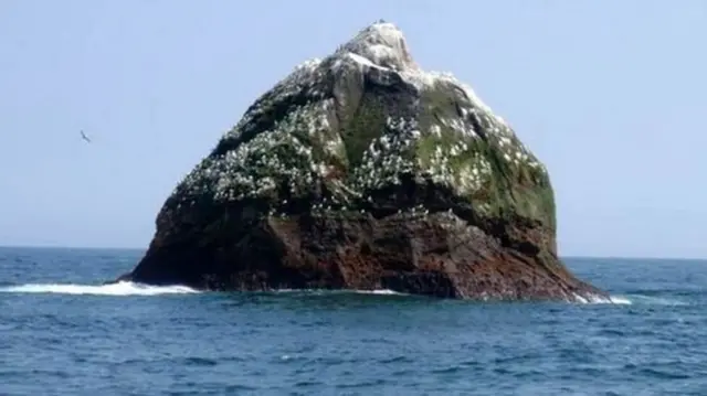 The Scottish government has threatened action against Irish vessels found fishing within 12 miles of Rockall