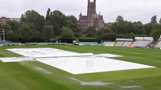 Covers on and puddles at New Road this morning