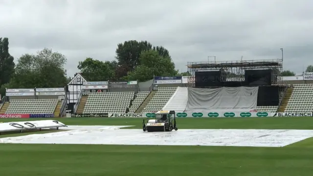 Rain being mopped up at New Road