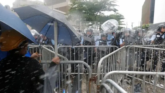 Police confront protesters during a demonstration against a proposed extradition bill, near the Legislative Council in Hong Kong, China June 12, 2019