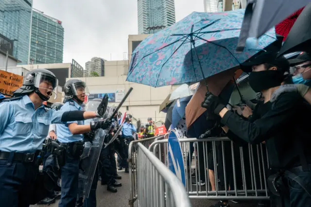 Protesters face-off with police