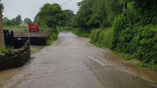 Road flooded in Westbury