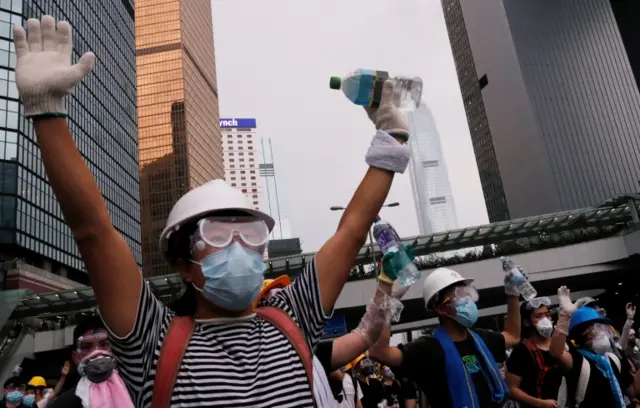 Protesters gesture during a demonstration against a proposed extradition bill in Hong Kong, China June 12, 2019