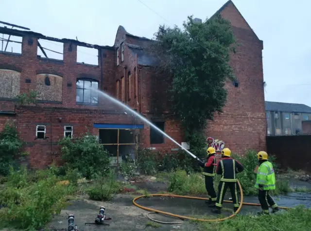 Crews dampening down at Walsall fire site