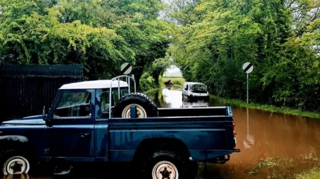 Vehicle stuck in floodwater