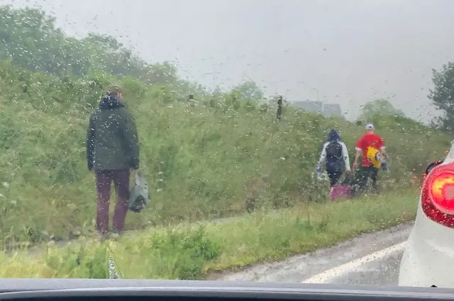 People walking with luggage