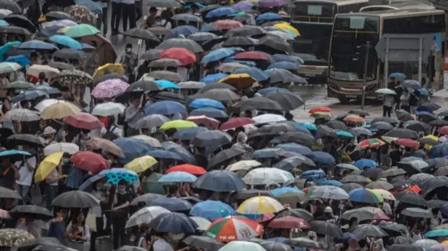 Protesters occupy two main highways near the government headquarters in Hong Kong on June 12, 2019