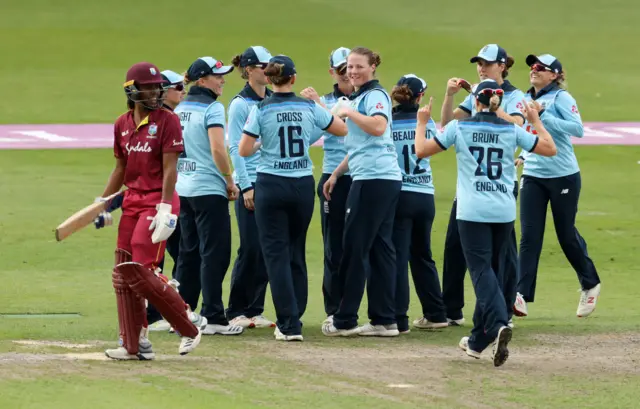 England celebrate a wicket