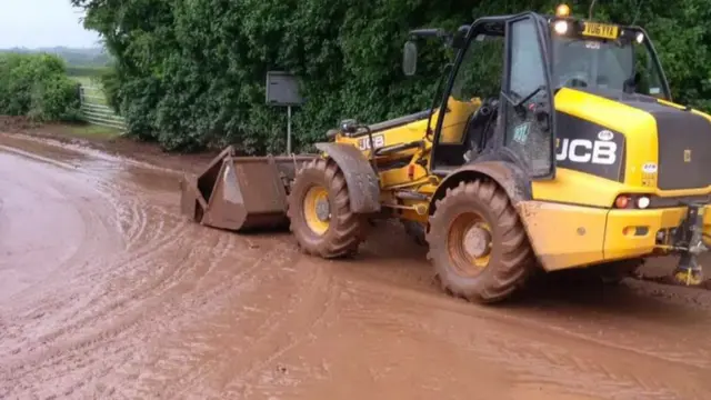 Mud washed on to a road