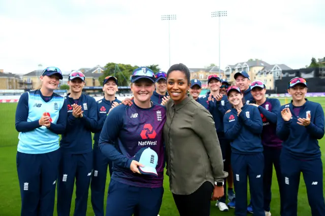 Ebony Rainford-Brent presents Bryony Smith of England with her cap ahead of the 3rd One Day International match between England Women and West Indies Women