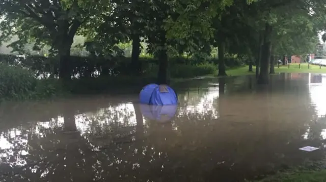 Tent in flood water