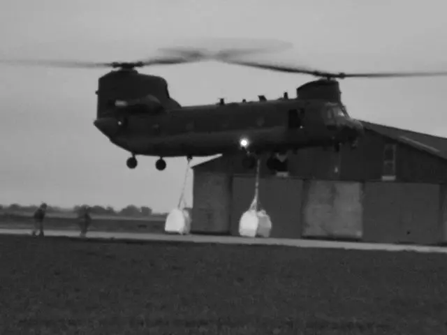 Helicopter taking off to take sandbags to Wainfleet