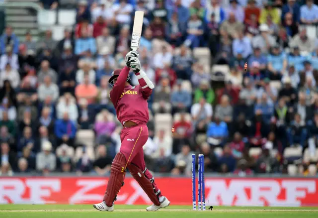 Shannon Gabriel of West Indies is bowled by Mark Wood of England