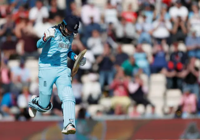 Joe Root celebrates his century