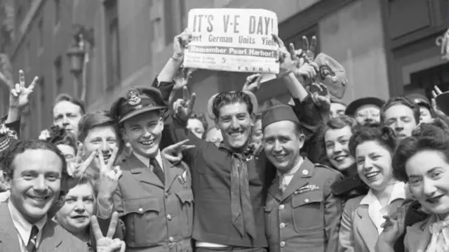 Crowds celebrating VE Day