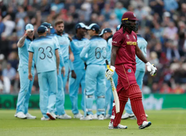 Chris Gayle walks off after losing his wicket