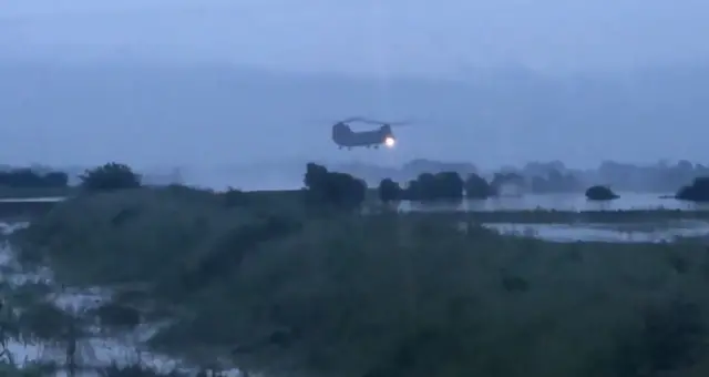 Chinook over flooding