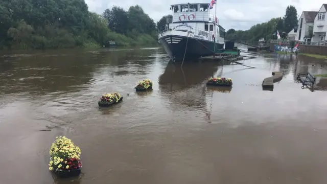 Flowers almost submerged in Upton-upon-Severn