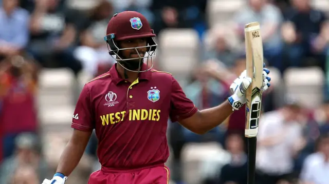 Nicholas Pooran celebrates his half century