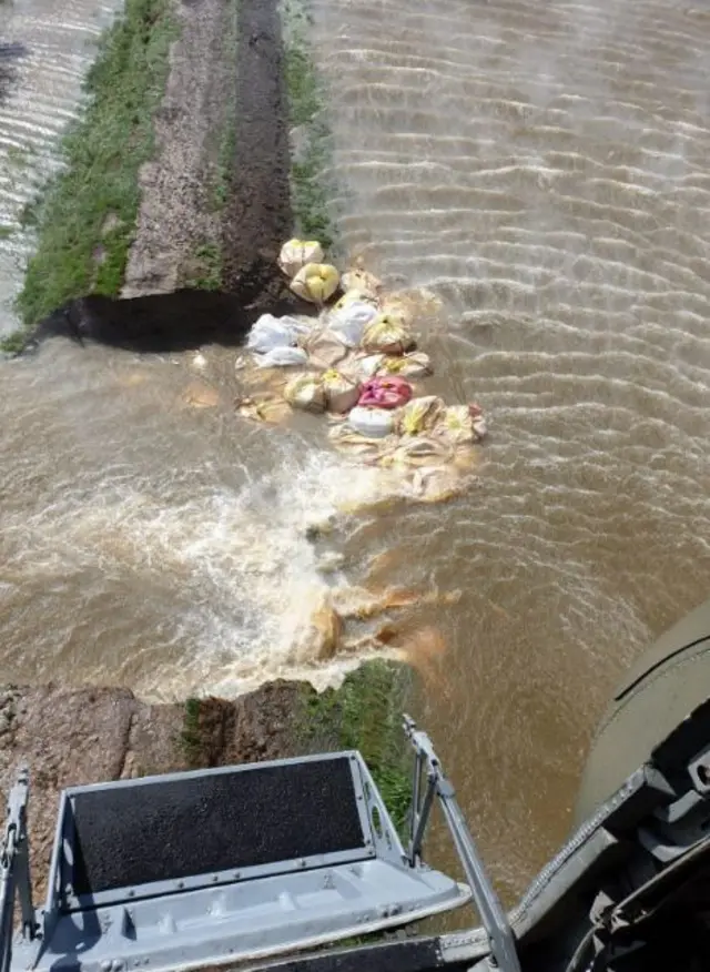 Sand bags in River Steeping