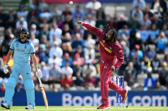 Chris Gayle of West Indies bowls