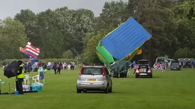 The bouncing castles blowing away