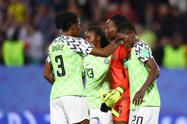 Nigeria's keeper is consoled by her team mates