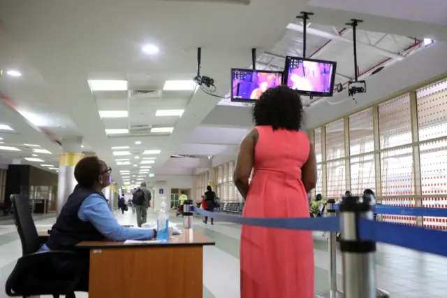 Woman looking at screens with a heat test