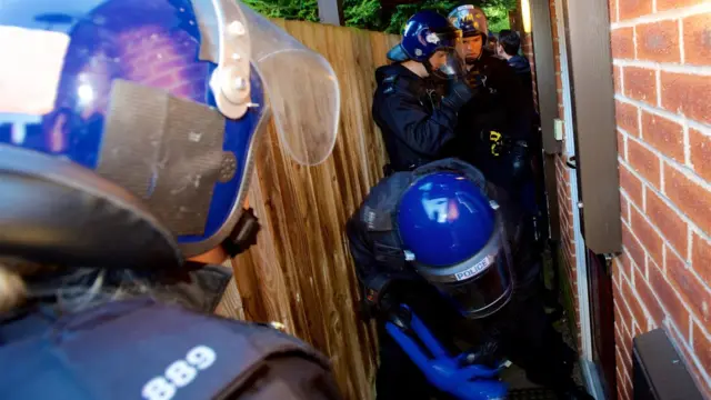 Police officers in helmets